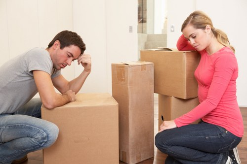 Professional movers handling household items during a Wealdstone relocation